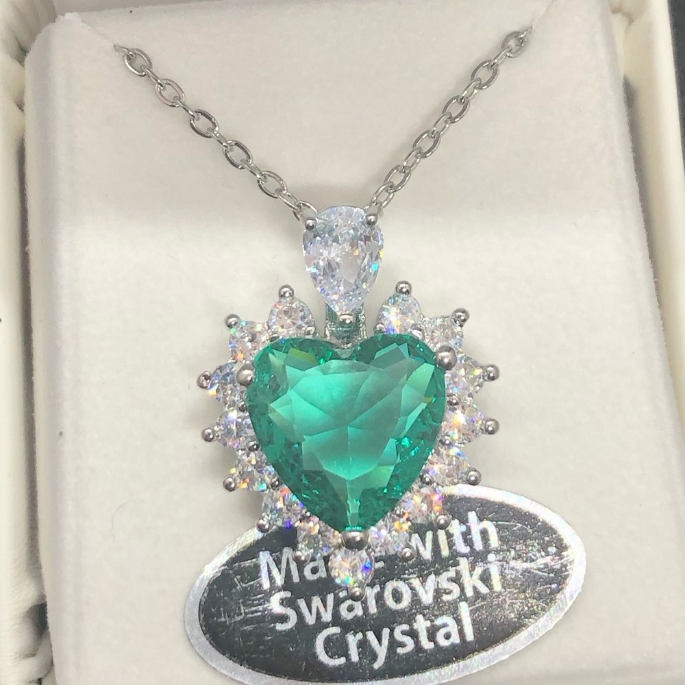 Beautiful Swarovski heart shaped crystals necklace. 16” S. Steel chain w/2” adj.
